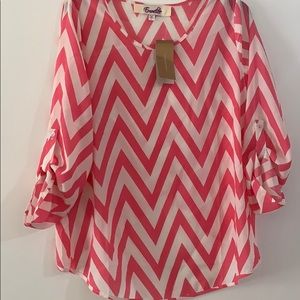 Quarter length sleeve blouse.